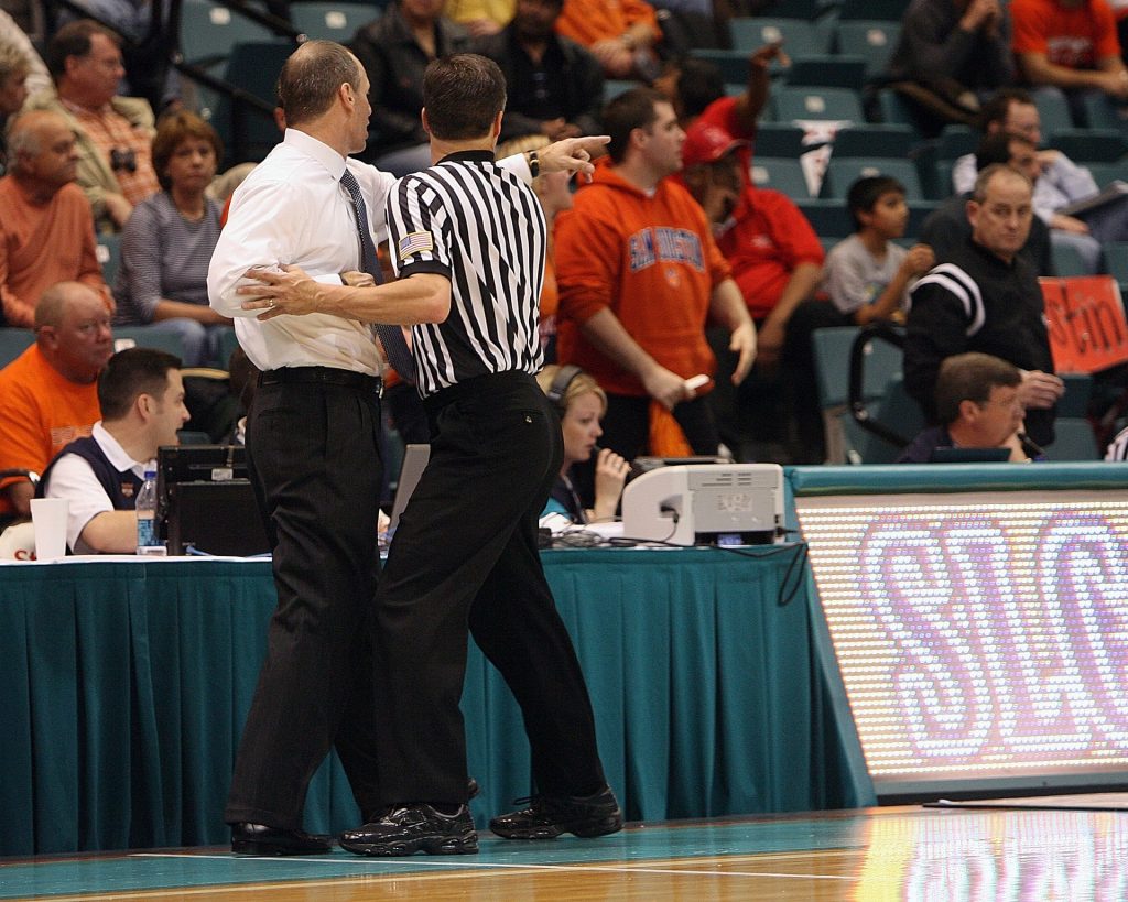 coach and referee